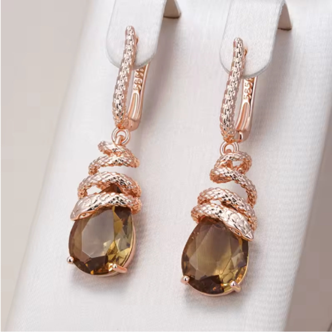 Elegante baumelnde orangefarbene Kristall-Ohrringe