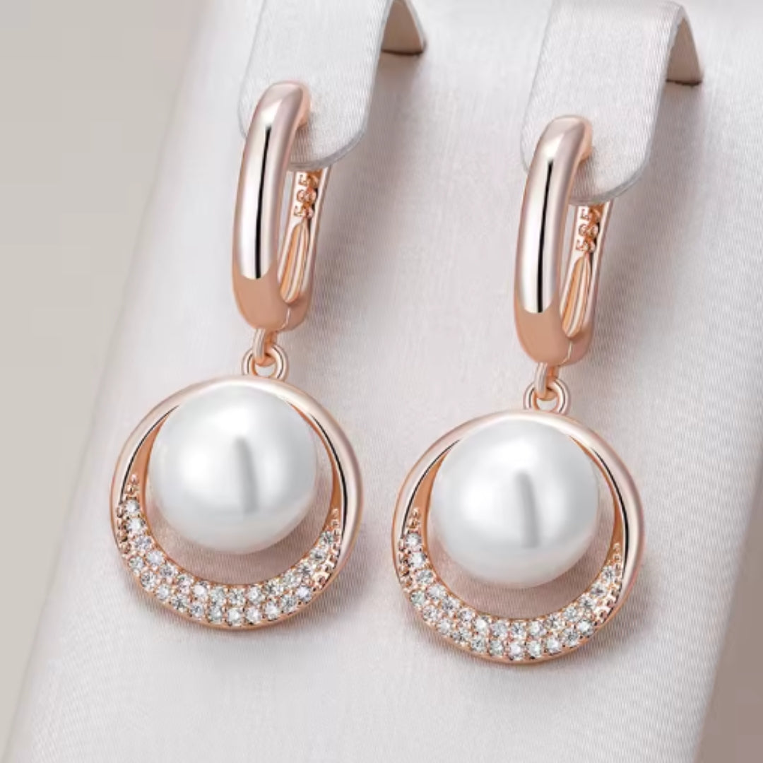 Elegante große Perlenohrringe in Gold